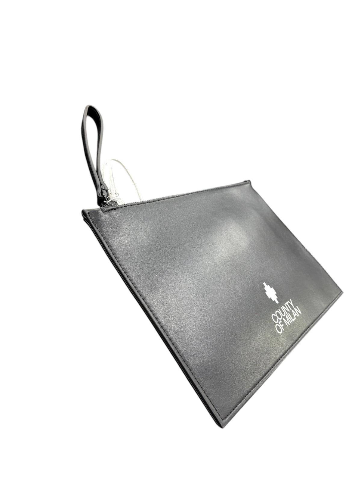 COMAS260331- - BORSA - Marcelo burlon
